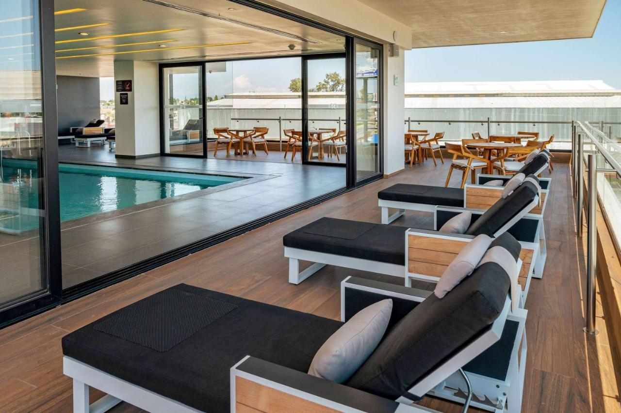 Ramada Encore By Wyndham Guadalajara Aeropuerto Las Pintas Экстерьер фото